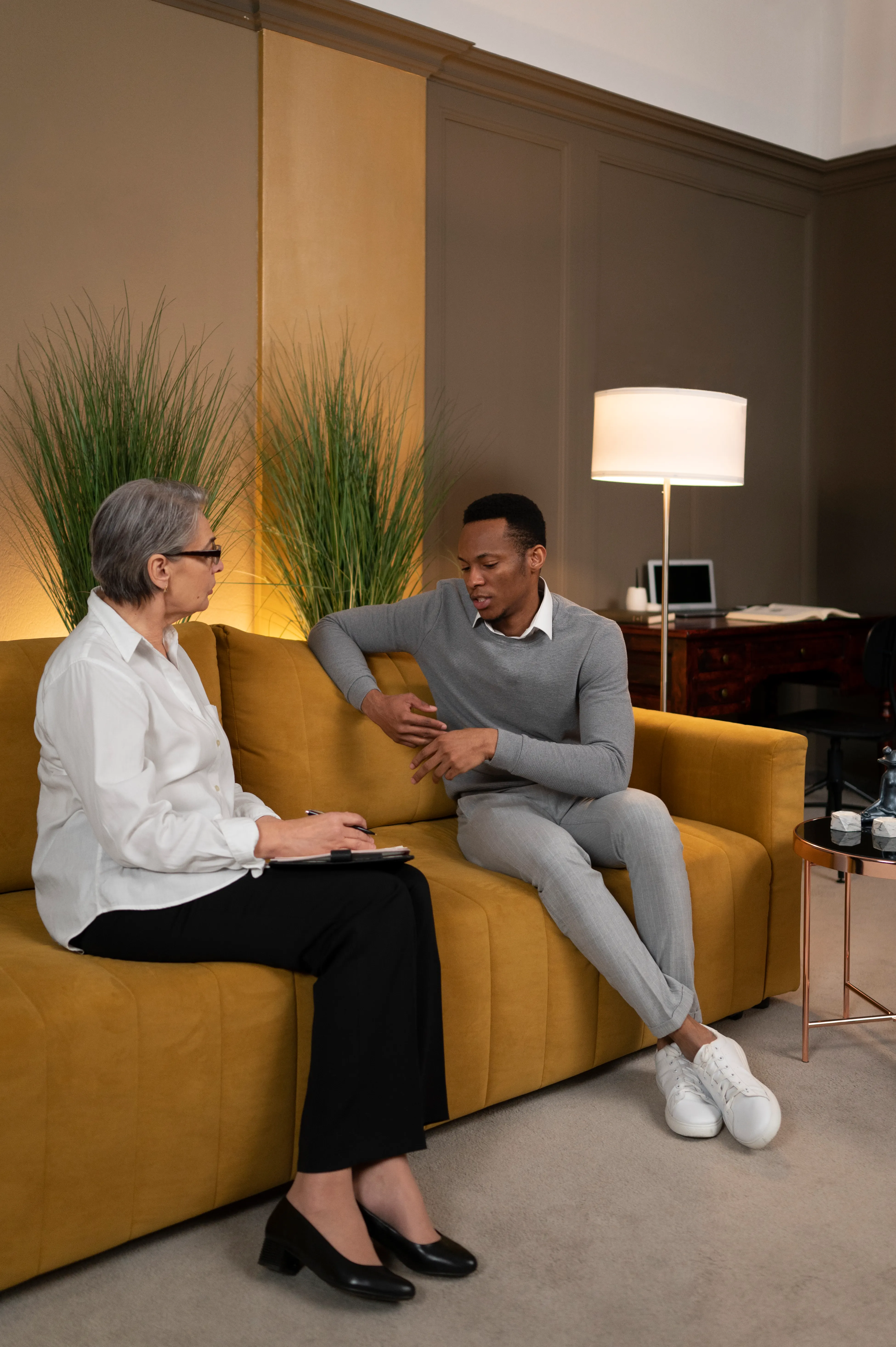 A relaxed conversation in a bright living room